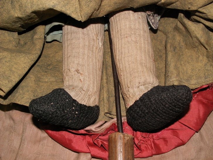 Particolare delle gambe dopo il restauro